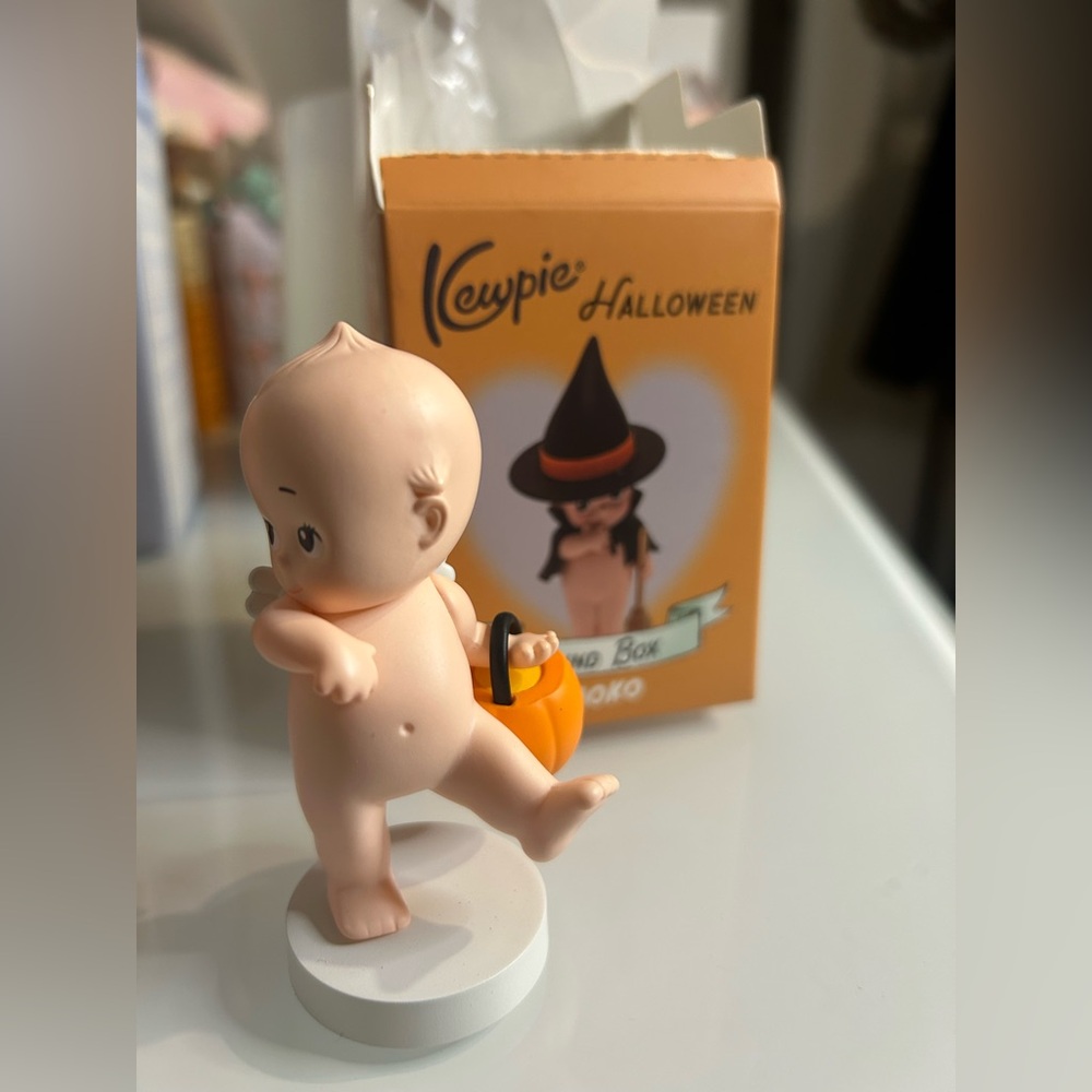 Kewpie Halloween Trick or Treat Figurine with Orange Pumpkin